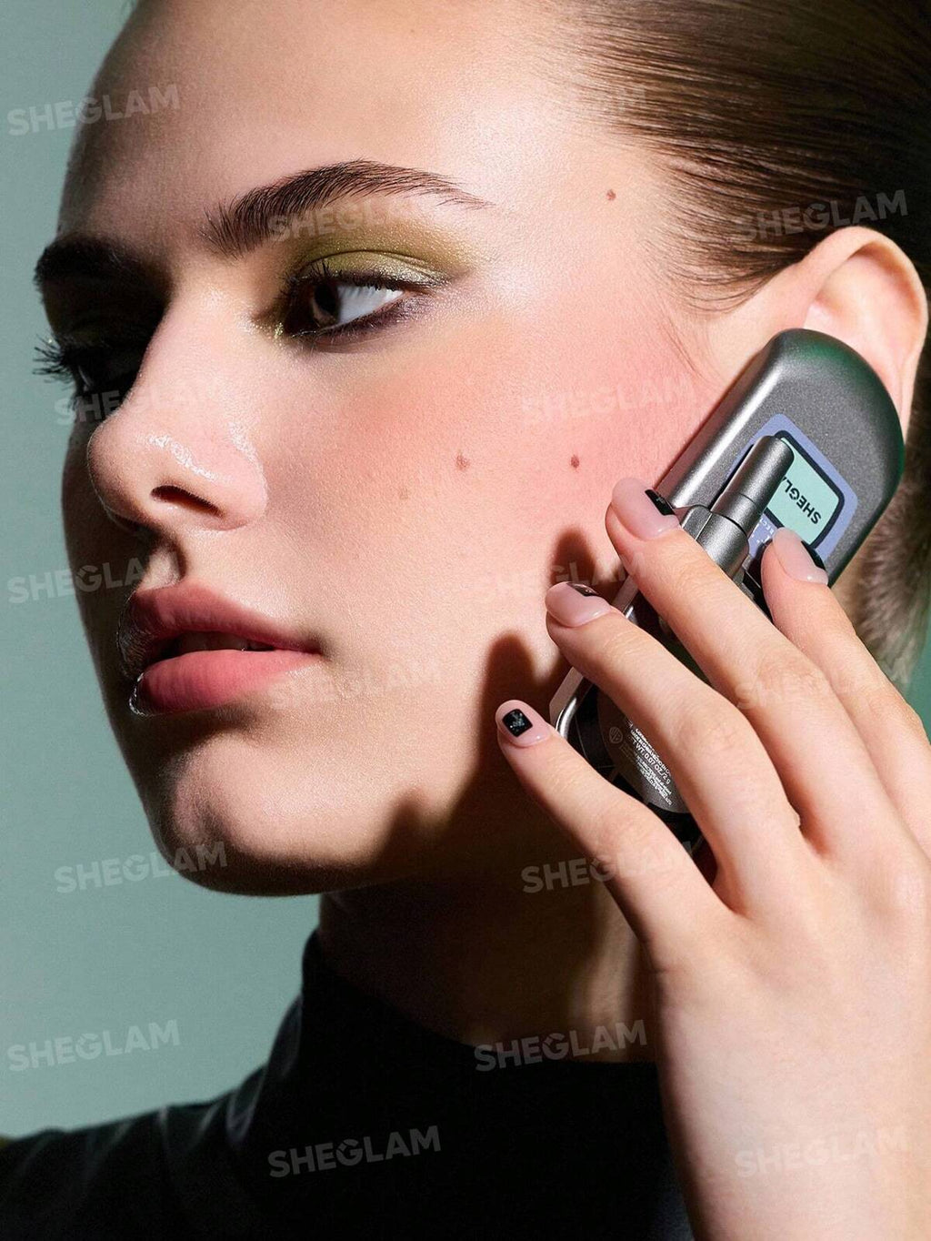 The Matrix Resurrections | SHEGLAM Going Digital Two-Tone flip phone Blush